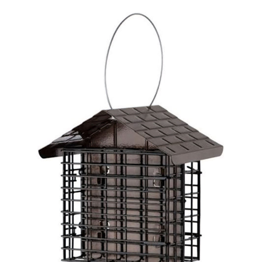 A long brown suet feeder with a metal shingled rood and yellow stoke packaging