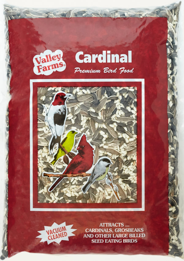 Valley Farms Cardinal Mix Wild Bird Food product packaged in maroon with see thru window, bird images, contents are striped sunflower, black oil sunflower, Safflower seed, Buckwheat. Attracts Cardinals, Grosbeaks, Nuthatch, Pine Siskin, Sparrows, Woodpeckers
